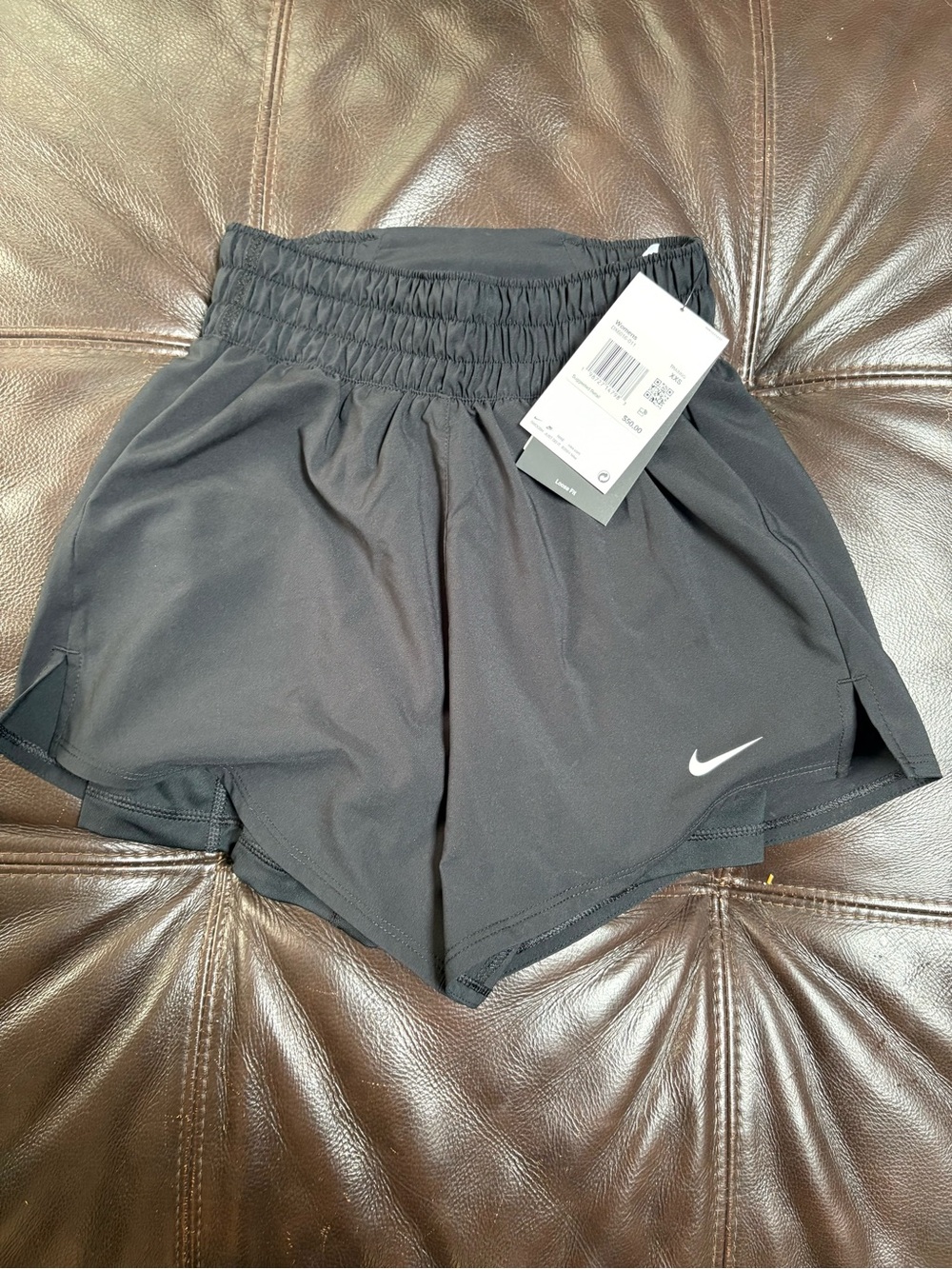 Nike Women’s Black Athletic Shorts with White Swoosh